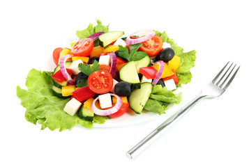 Tasty Greek salad isolated on white