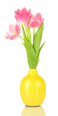 Pink tulips in bright vase, isolated on white