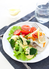 Steamed fish and broccoli
