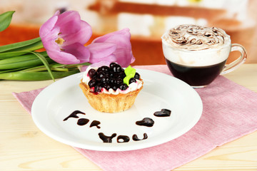 Sweet cake with blackberry and chocolate sauce