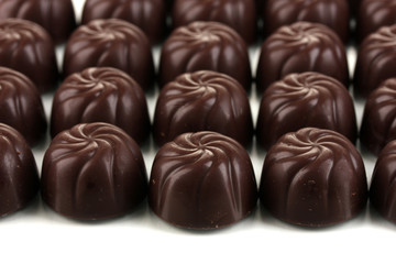 Chocolate candies isolated on white