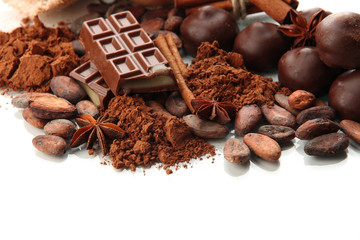 Composition of chocolate sweets, cocoa and spices, isolated