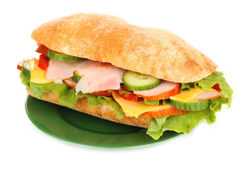 Fresh and tasty sandwich with ham and vegetables isolated