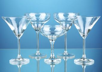 Cocktail glass set on blue background