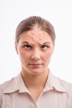 A woman with an injury on his forehead