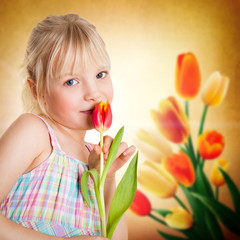 Obraz na płótnie Canvas kleines Mädchen mit Tulpe