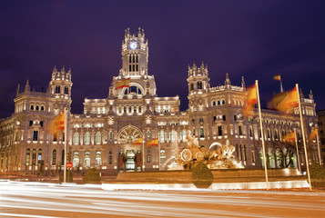 Fototapeta na wymiar Madrid - Communications Palace from Plaza de Cibeles in dusk