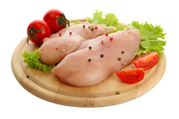 raw chicken meat on cutting board, isolated on white