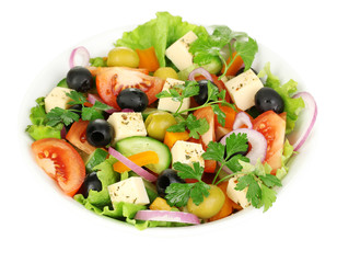 Greek salad in plate isolated on white