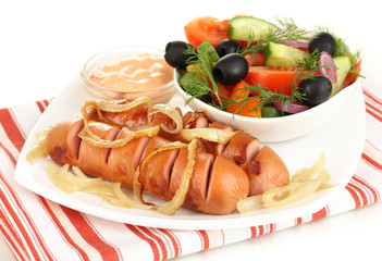 Grilled sausage with fresh salad close up