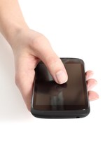 Woman hand touching a touch screen of a mobile phone