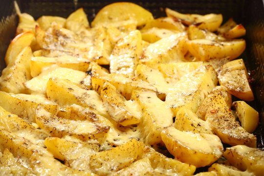 Roasted potatoes with spices and cheese