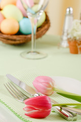 Fototapeta na wymiar Easter Table Setting With Pink Tulips