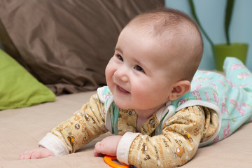 Smiling child in bed