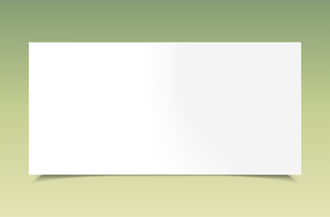 Blank white paper on green background