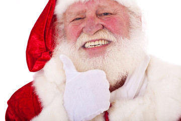 Obraz premium Weihnachtsmann zeigt Daumen hoch