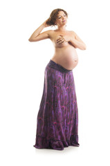 Beautiful pregnant woman - isolated over a white background