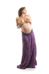 Beautiful pregnant woman - isolated over a white background