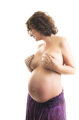 Beautiful pregnant woman - isolated over a white background