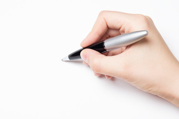 female hand with pen over white