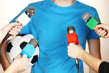 Conference meeting microphones and footballer