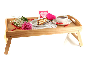 Breakfast in bed on Valentine's Day isolated on white
