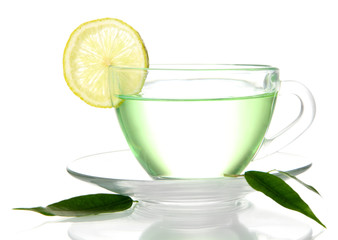 Transparent cup of green tea with lemon, isolated on white