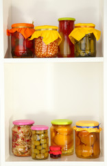 Different conservations on white shelves