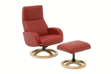 Red armchair with leg rest.