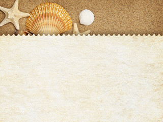 Summer background - blank paper sheet on sand