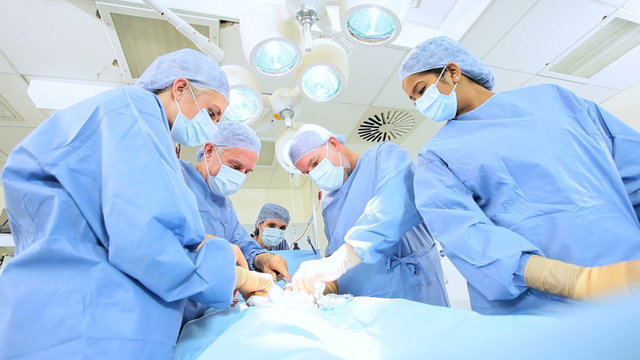 Male Female Doctors in Operating Room