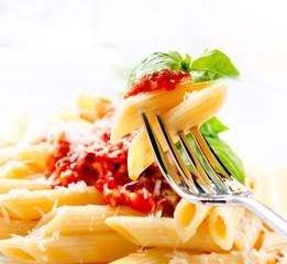 Pasta Penne with Bolognese Sauce, Basil and Parmesan