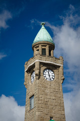 Fototapeta na wymiar clock tower in Hamburg harbor