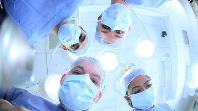Doctors in Hospital Operating Room Faces Hands
