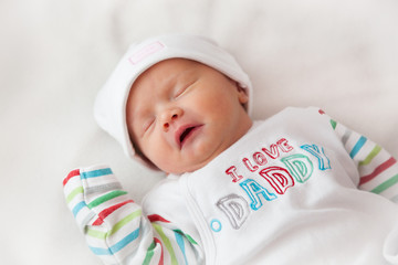 Beautiful newborn baby girl sleeping
