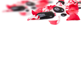 Pink rose petals and stones