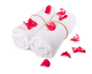 white towels with red petals