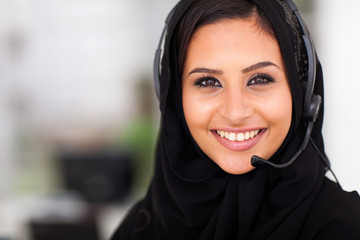 middle eastern businesswoman with headphones