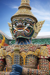 Naklejka premium Giant guarding statue at Temple of the Emerald Buddha