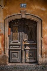 old wooden house Door in city Pardubice