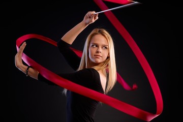 Young dancer with ribbon