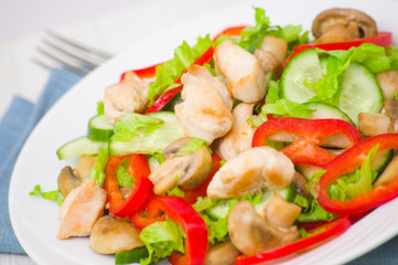 salad with chicken, mushrooms and vegetables