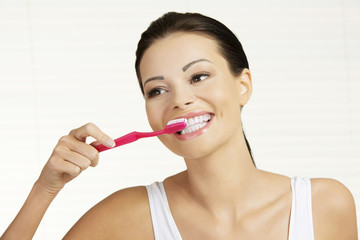 Woman  holding tooth brush