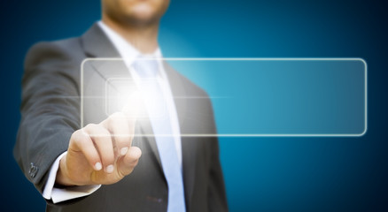 Businessman touching digital screen.