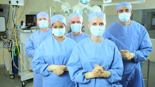 Portrait Male Female Hospital Surgical Team