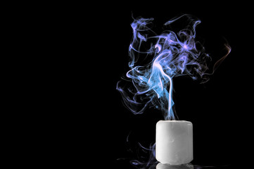 Candle with smoke