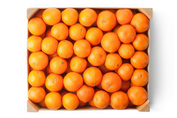 Crate of ripe tangerines. Top view.