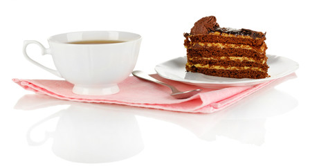 A cup of tea and delicious cake isolated on white