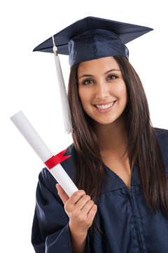 Beautiful graduate in cap and gown holding diploma