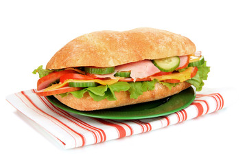 Fresh and tasty sandwich with ham and vegetables isolated